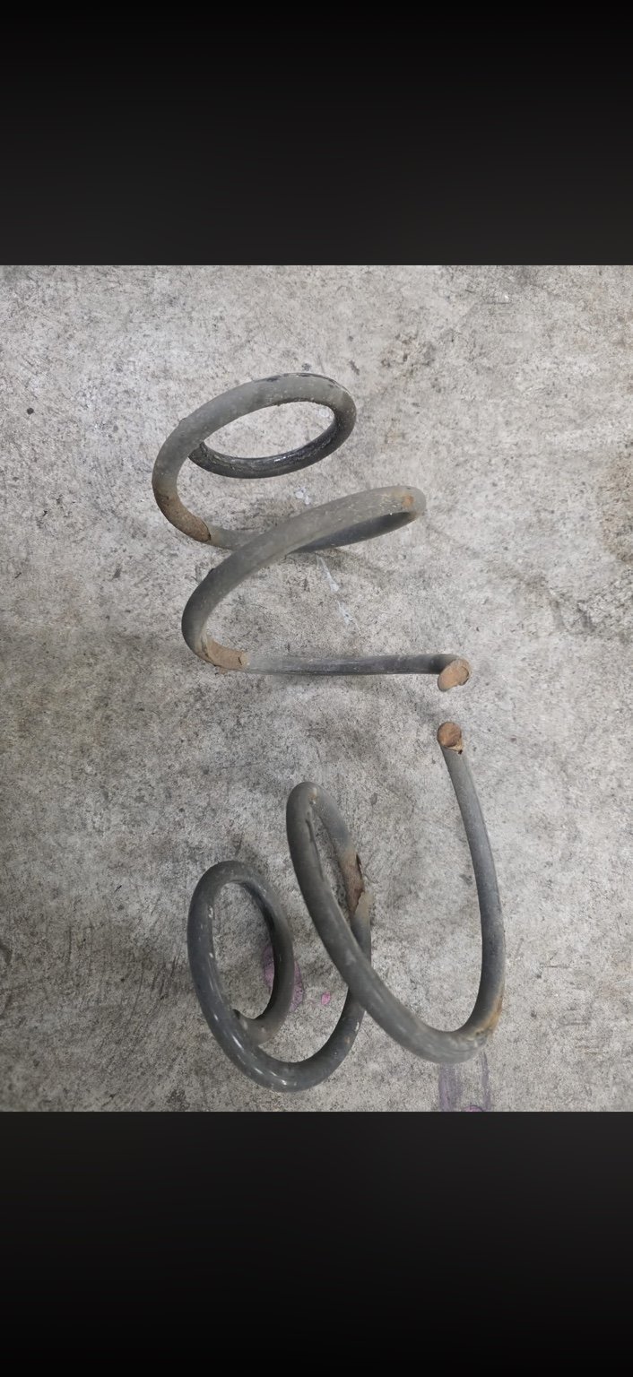 Broken suspension spring removed from a Mercedes-Benz